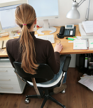 Mother balancing work and childcare responsibilities