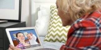 Video Call And Chat Concept. Senior Woman Video Conferencing On Tablet