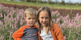 Pittsburgh area kids Whitney and Gavin pose together at Simmons Farm in McMurray, Pennsylvania.