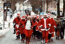 Family Fun Events in Pittsburgh: Dec. 6-7 People dressed like Santa Claus running down the street