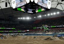 A monster truck show in a large stadium