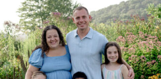 Caitlyn Waruszewski (second from left) and her family