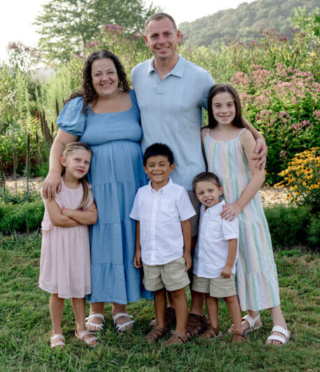 Caitlyn Waruszewski (second from left) and her family