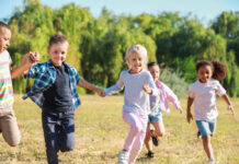 Group of running children in park