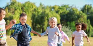 Group of running children in park