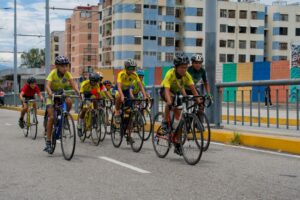 Kids riding bikes through a city